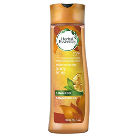 Herbal Essences shampoo pouring into palm highlighting lightweight formula