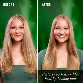 Herbal Essences oil in hand ready for application to mid-lengths and ends benefit