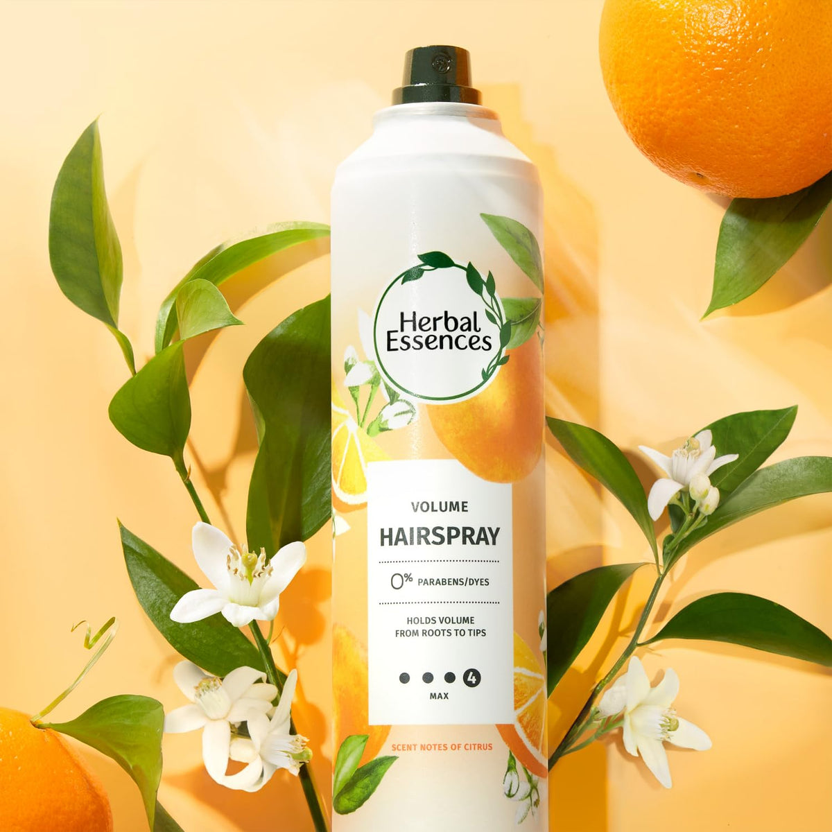 Herbal Essences lifestyle shot with model enjoying fresh citrus scent