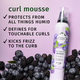 Herbal Essences mousse foam close-up showing airy texture for easy spread