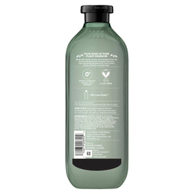 Styled bathroom shelf with Herbal Essences bottle illustrating everyday color care routine