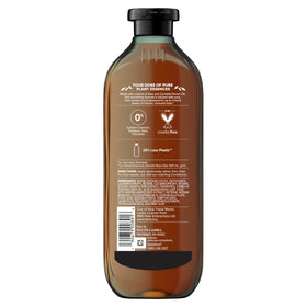 Herbal Essences bottle staged on bathroom shelf conveying natural, plant-based care