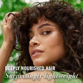 Herbal Essences recycled plastic bottle back emphasizing eco packaging