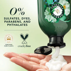 Herbal Essences bottles held in hand for size comparison and travel convenience