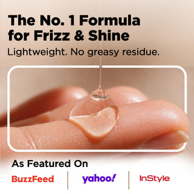 HerStyler serum drop on fingertip highlighting controlled dispensing benefit