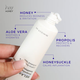 Hey Honey Relax being applied to cheek to reduce redness and calm irritation