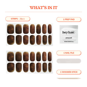 heyhae kit layout with 28 strips, prep pad, file and wooden stick for a complete manicure