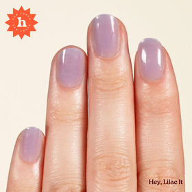 heyhae strips on hand during application for quick at-home manicure benefit