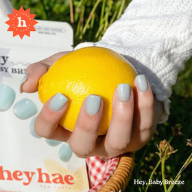 heyhae strips applied on hands outdoors curing in sunlight for durable results