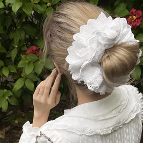 Heyiminy used in a loose bun demonstrating secure, low-damage styling