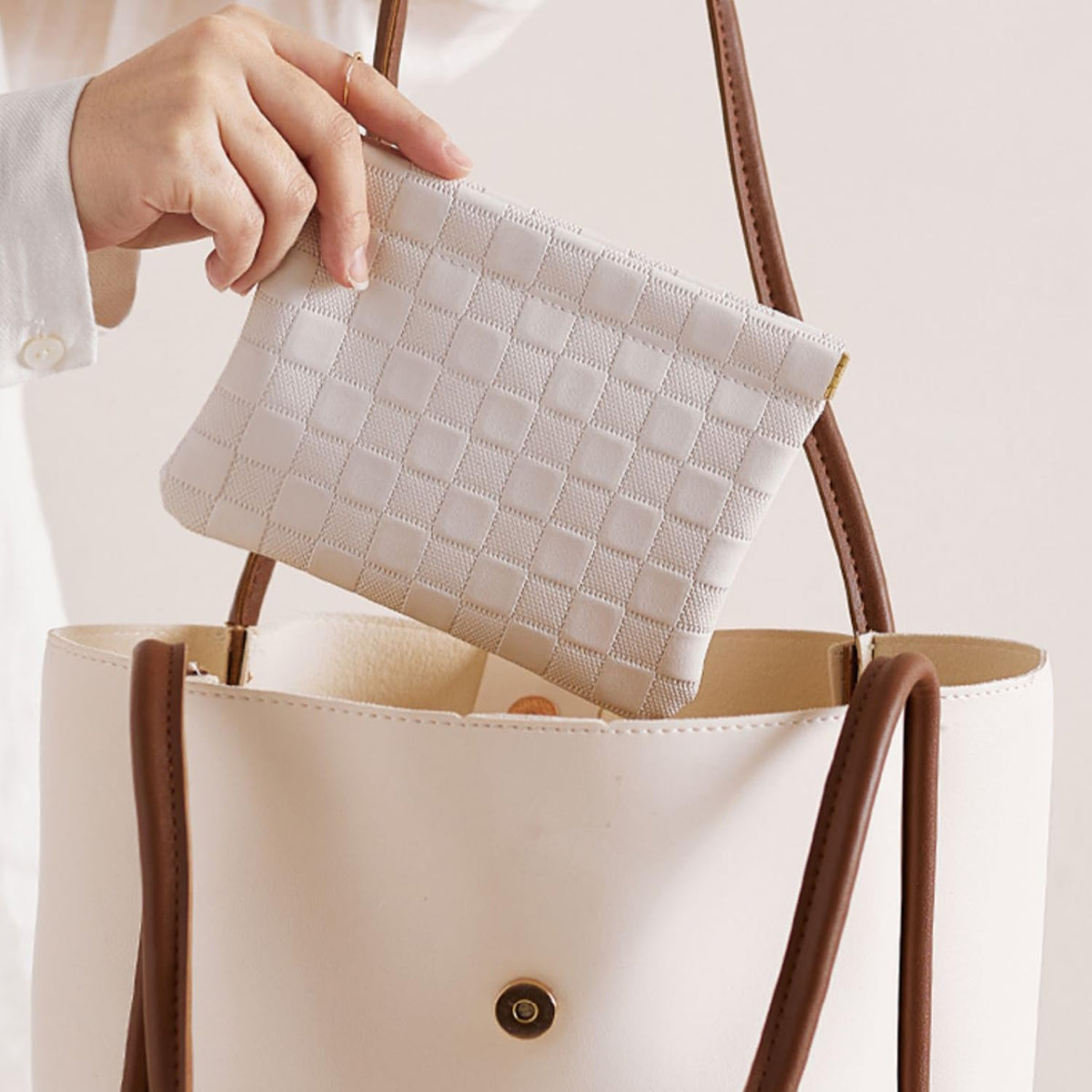 HIGH FIT bag inside a handbag showing organized storage and everyday convenience