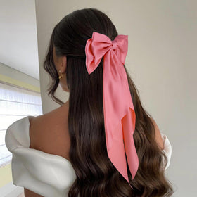 hisial red bow long tail detail displays flowing ribbon for drama