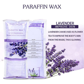 Person dipping hand into HLead lavender paraffin, soothing warmth and skin hydration