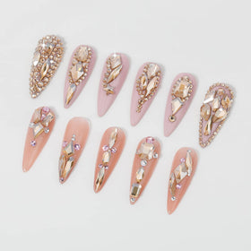 HNUIX gems on fingernails for size comparison, clear size choices for design planning