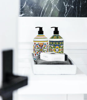 Home & Body Company styled on a kitchen counter showing décor compatibility and hands-on convenience benefit