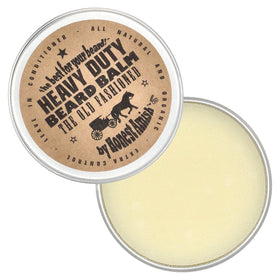 Honest Amish 2 ounce balm next to coin for size comparison practical benefit