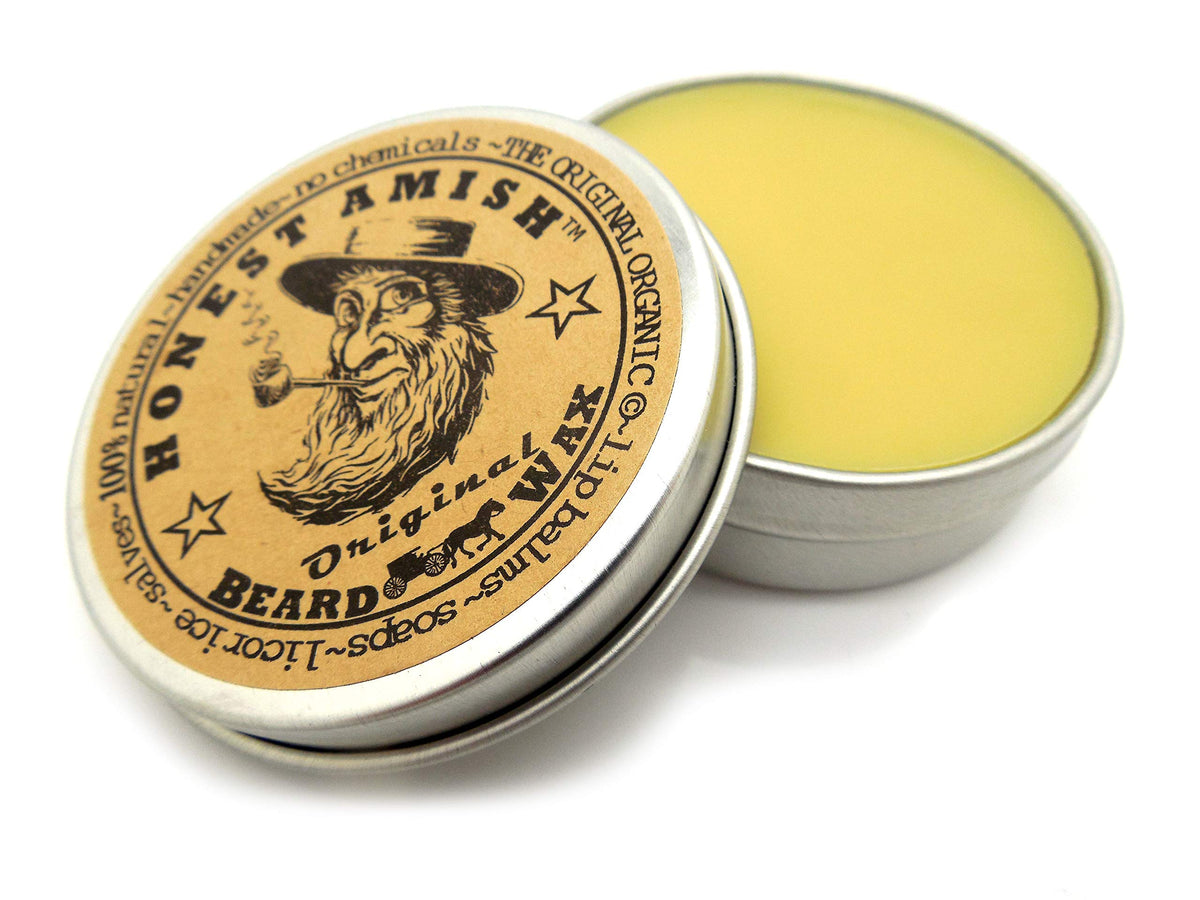 Honest Amish tin held in hand to show 2 ounce scale and everyday convenience