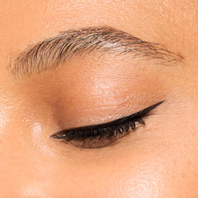 Honest Beauty eyeliner applied on eye showing crisp wing and clean finish