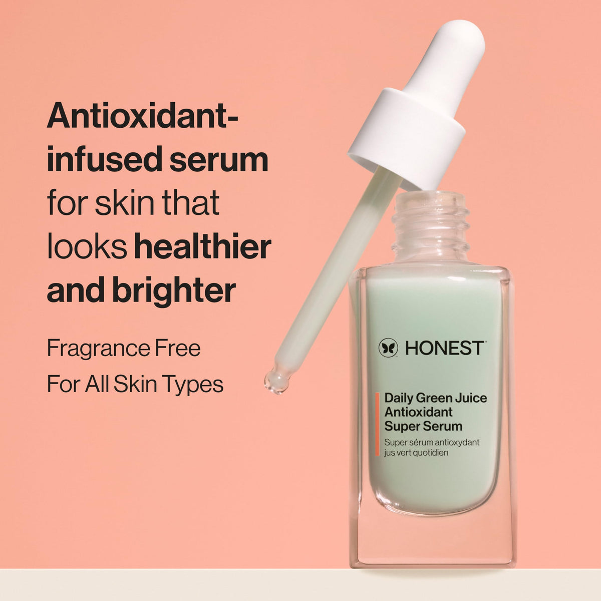 Honest Beauty serum texture on fingertip illustrating lightweight absorption