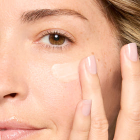 Honest Beauty eye balm in bathroom scene showing daily routine and calming self-care