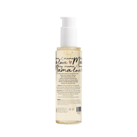 Lifestyle-shot of expectant mom using The Honest Company oil during self-care routine for comfort