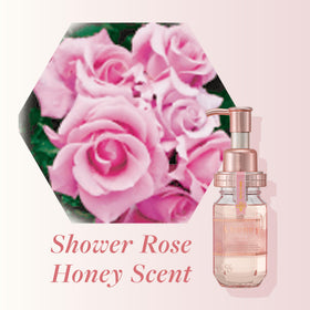 &Honey oil in hands applying to damp hair to reduce frizz and aid detangling