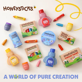 Child watching Honeysticks tablet fizz in bathtub, engaging safe bathtime