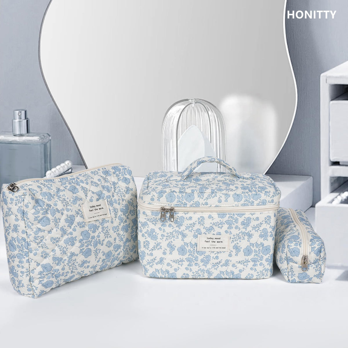 honitty small pouch beside coins and keys to show compact scale benefit