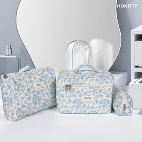 honitty small pouch beside coins and keys to show compact scale benefit