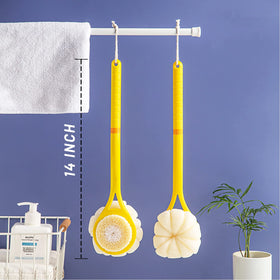 HONOMA brush beside a hand for size comparison showing 14-inch reach benefit