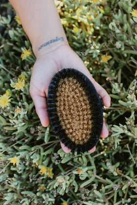 HOT HAVEN bristle close-up showing ionic copper fibers for gentle exfoliation