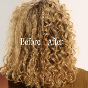 HOT TOOLS curling iron held in hand to show length and size for long hair