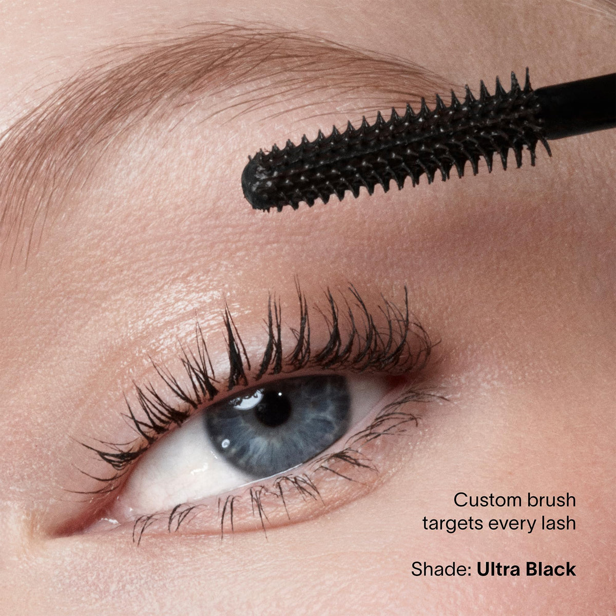 HOURGLASS mascara being applied to lashes highlighting easy buildable application