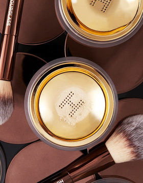 HOURGLASS Veil in use application under eye for crease prevention and brightening