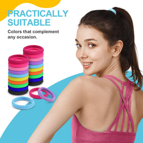 HOYOLS hair tie held in hand to show compact 4cm size and portability
