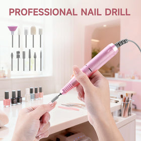 HQMPHQ nail drill in use on salon client demonstrating quiet, professional performance