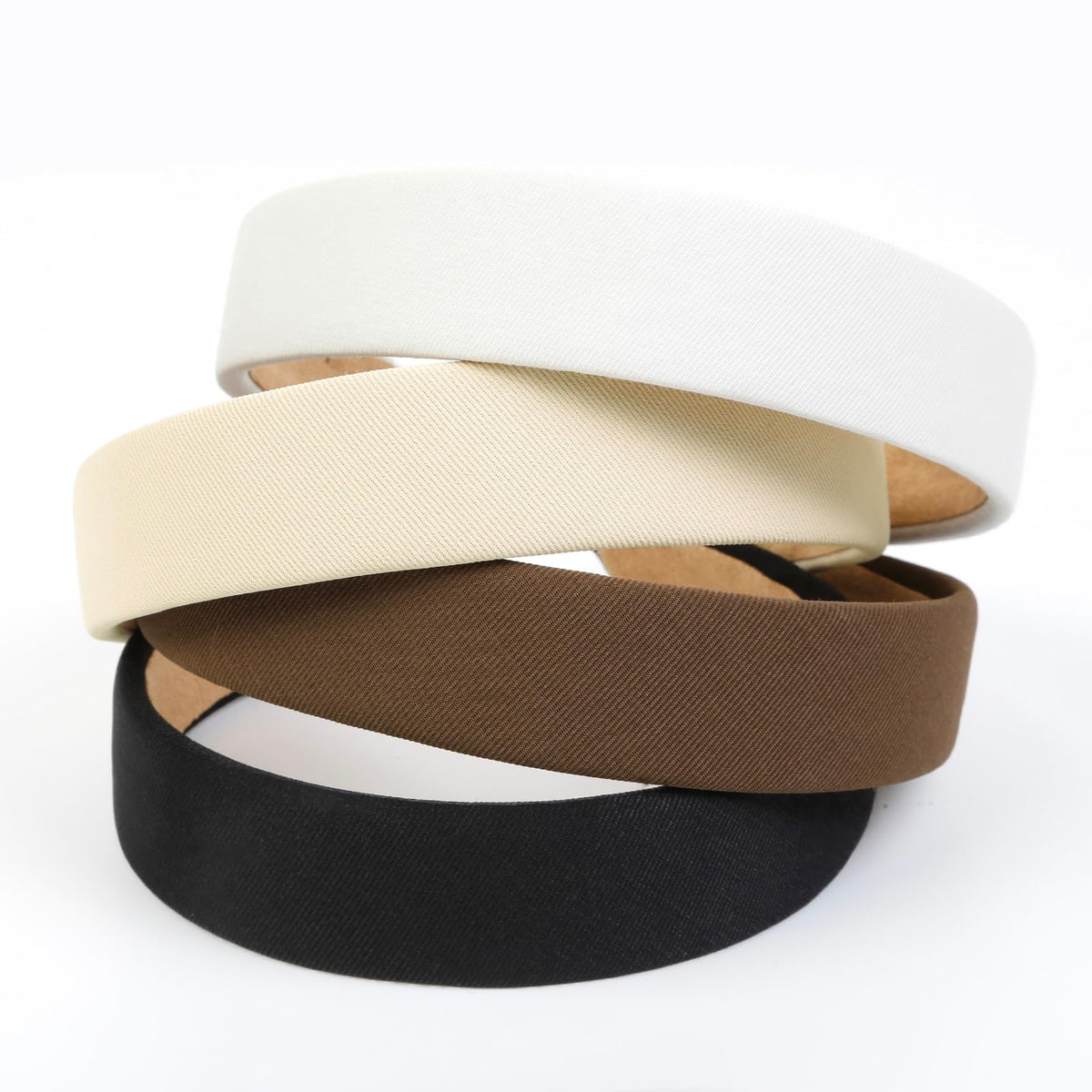 Huachi color set laid flat highlighting black, white, beige and brown options for outfit matching