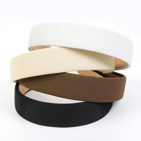 Huachi color set laid flat highlighting black, white, beige and brown options for outfit matching