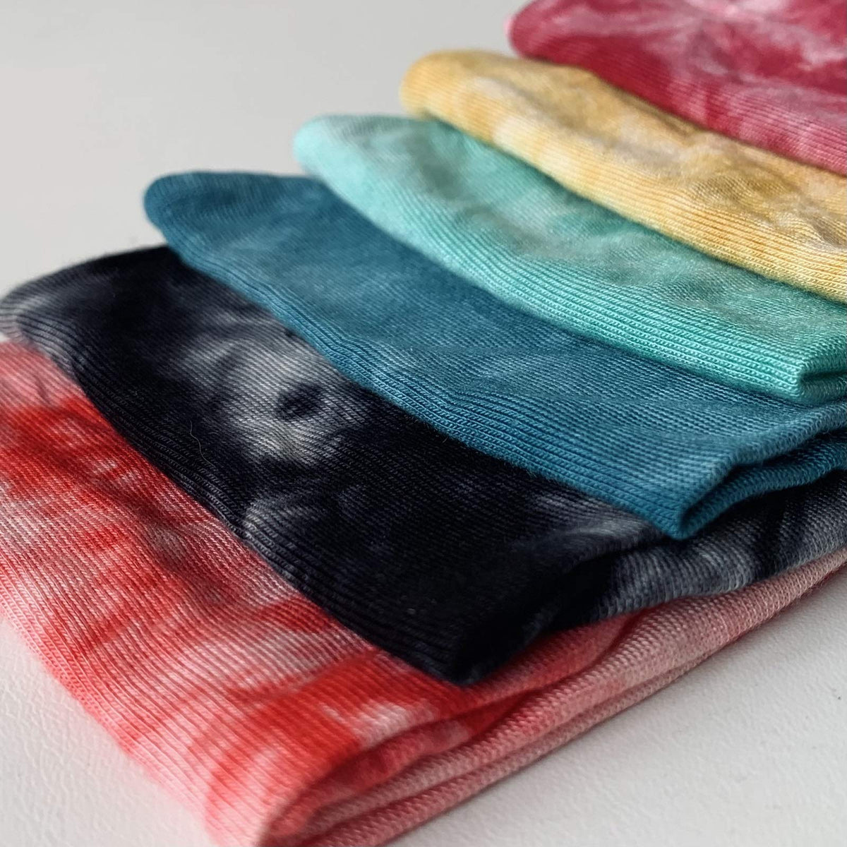 Huachi six headbands laid flat showing color assortment and versatility