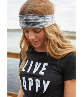 Huachi headband worn during yoga demonstrating secure non-slip hold