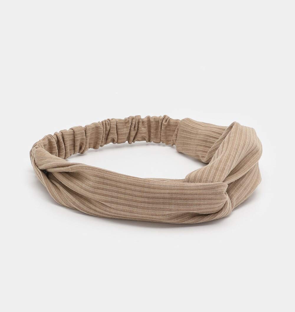 Huachi twist-knot close-up highlighting design and polished look