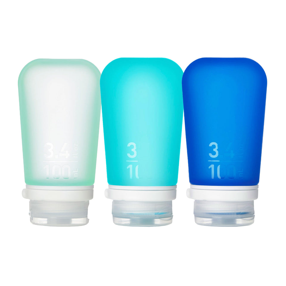 humangear GoToob+ three‑pack front view showing mint aqua teal bottles, convenient travel storage