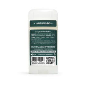 HUMBLE deodorant next to a smartphone showing compact size and travel convenience