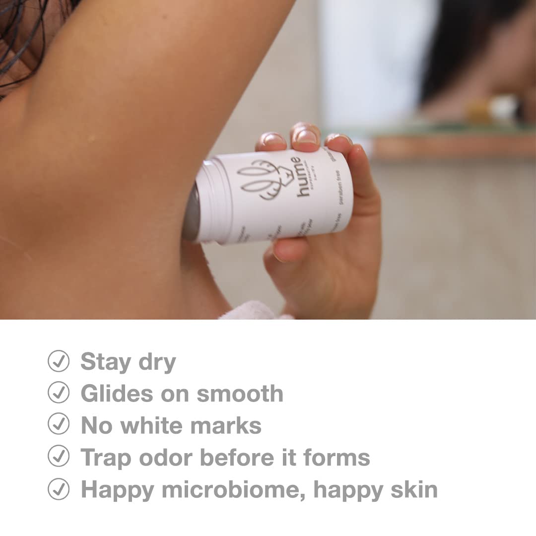 Applying Hume Supernatural clear stick to underarm for dry, non-staining finish