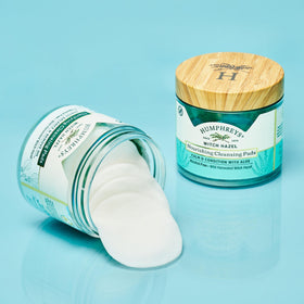 Humphreys cleansing pad in hand demonstrating convenient single-use benefit