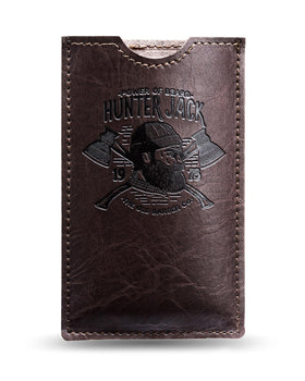 Hunter Jack comb beside a wallet to show compact pocket-friendly scale