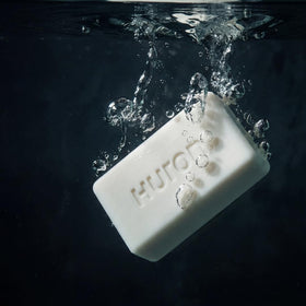 Huron soap in a bathroom lifestyle scene conveying fresh citrus eucalyptus scent
