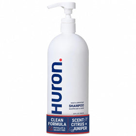 Huron bottle front view showing label and citrus scent, highlights clean formula