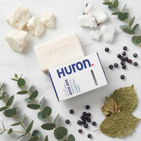 Huron bar held in hand for size comparison showing travel-friendly dimensions