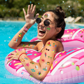 Huskein tattoo being applied wet on skin for quick easy use